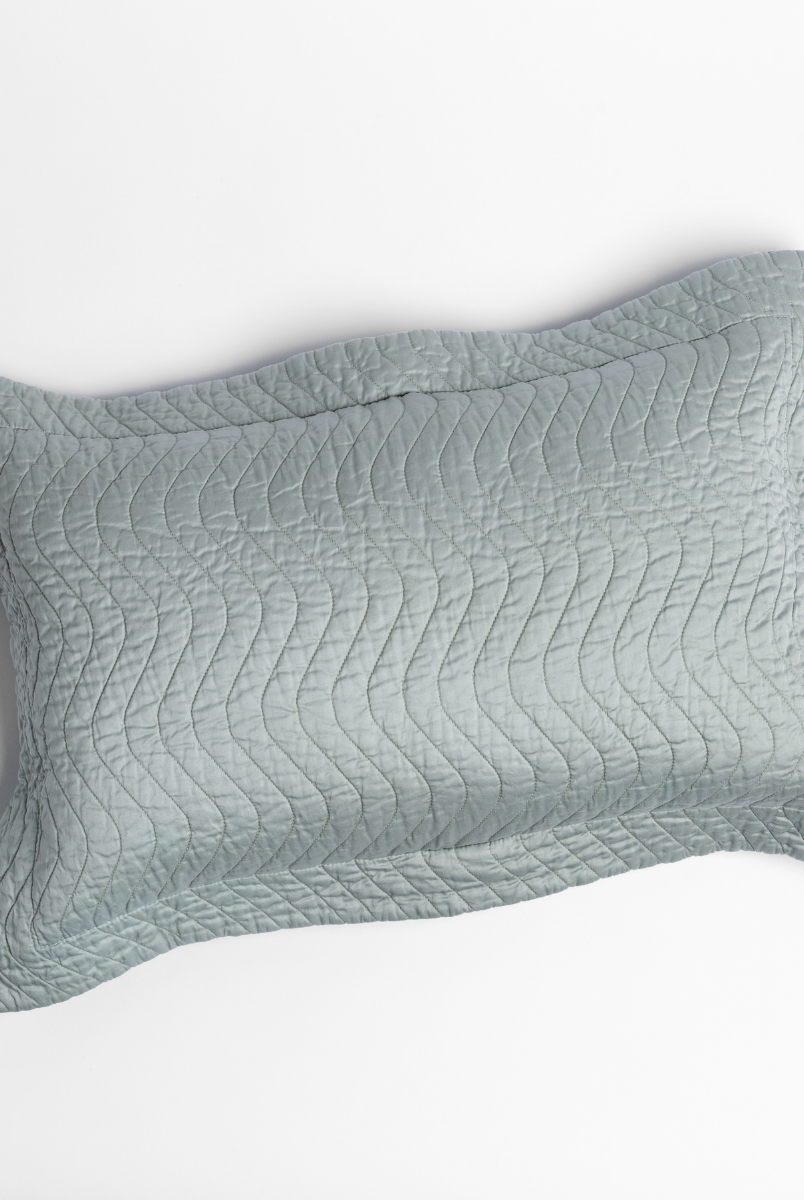 Eucalyptus: 15x24 quilted cotton sateen throw pillow shot overhead against a white background. 